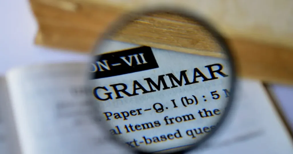 a magnifier showing the word grammar